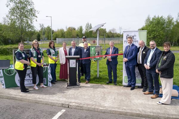 Minister of State Seán Canney cuts the tape at the unveiling of the new Eco Powered Cabinet at the Applegreen Service Station on the M4 motorway. The life-saving device was installed by Hollymount-based firm Eco Powered Cabinets whose CEO Darren Forde is pictured with other guests. Picture: Tommy Murphy, Teem Lens Media