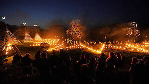 Spectators gather for ancient Celtic fire procession that welcomes summer Spectators gather for ancient Celtic fire procession that welcomes summer