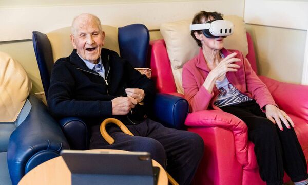 Nursing home residents enjoying the virtual reality tour.