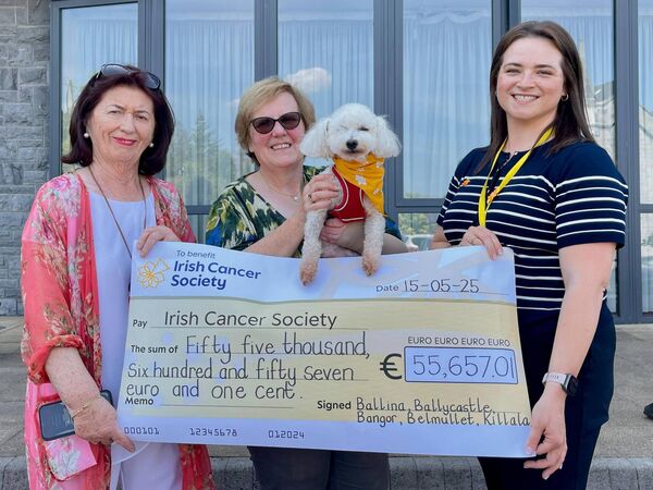 Mary Martin, Ballina (left), Volunteer Co-ordinator for Daffodil Day, presenting a cheque for €55,657.01 to Sara (right) from the Irish Cancer Society, the proceeds of Daffodil Day 2025 in North Mayo. Also included is Ursula Jordan Hanley and her dog Oscar, the Daffodil Day mascot. Mary Martin, Ballina (left), Volunteer Co-ordinator for Daffodil Day, presenting a cheque for €55,657.01 to Sara (right) from the Irish Cancer Society, the proceeds of Daffodil Day 2025 in North Mayo. Also included is Ursula Jordan Hanley and her dog Oscar, the Daffodil Day mascot.