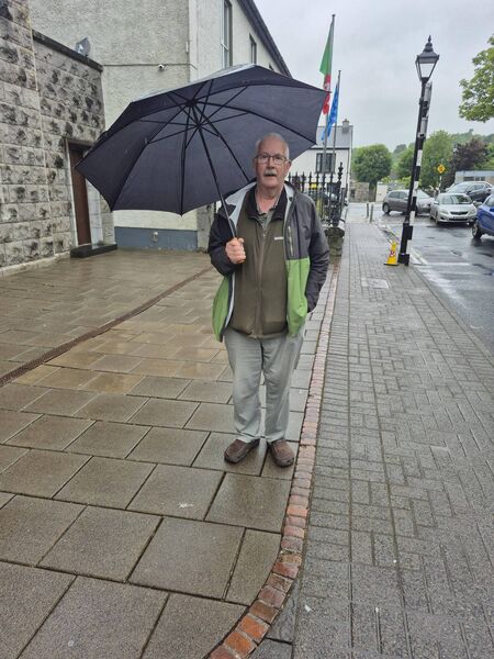 Well-known Castlebar man Ernie Sweeney outside St Mary's Church in Westport. 