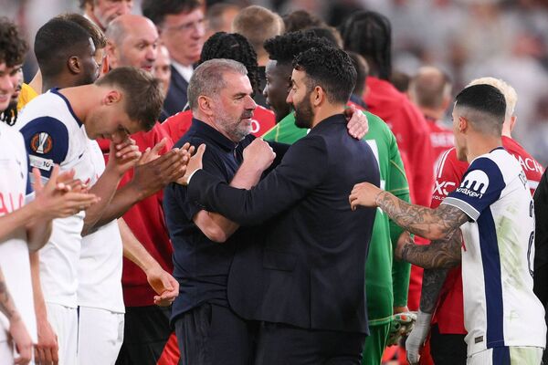 Ange Postecoglou, manager of Tottenham Hotspur, embraces Ruben Amorim, manager of Manchester United, during the medal ceremony after last Thursday's UEFA Europa League Final at Estadio de San Mames in Bilbao. Picture: David Ramos/Getty Images Ange Postecoglou, manager of Tottenham Hotspur, embraces Ruben Amorim, manager of Manchester United, during the medal ceremony after last Thursday's UEFA Europa League Final at Estadio de San Mames in Bilbao. Picture: David Ramos/Getty Images