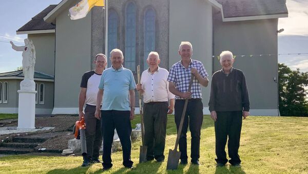 Tom Nally, Mike Corbett, Walter Hughes, Kevin Hughes and Tom McGrath getting the St Mary’s Church grounds in top shape for the children’s First Holy Communion. Picture by Tom Quinn