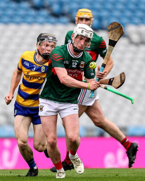 Roscommon's Darragh Finn attempts to hook Ryan Duffy of Mayo. Picture: INPHO