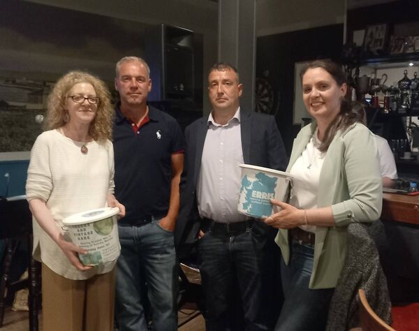 Dervilia Cullotty and Catherine Meenaghan of the Erris Family and Community Support Centre with JP Murphy and Andrew Howard (Una's Blacksod) at the presentation of funds raised at the recent Tractor Run in memory of Tommy Murphy.