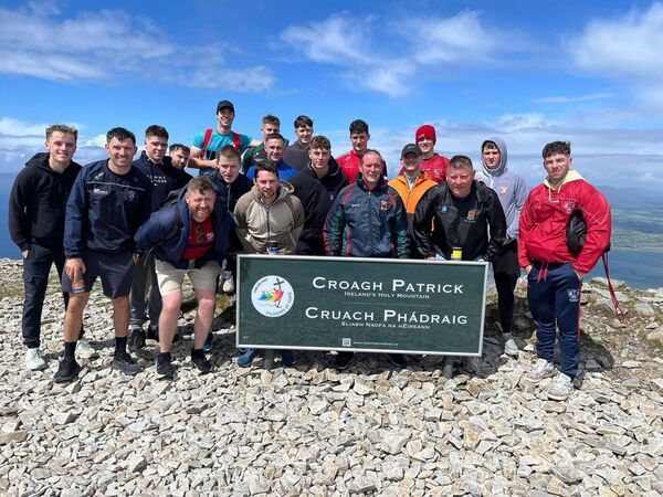 Members of Moy Davitts GAA Club's senior football panel who took some time out recently to scale Croagh Patrick. 
