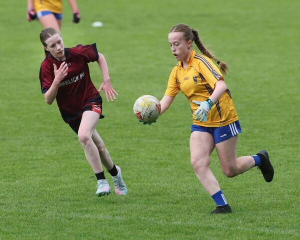Roundfort NS on the attack against Meelick NS in the Division 3 Girls final which was won by the South Mayo side. 