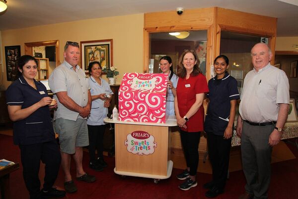 Friars Lodge Nursing Home in Ballinrobe celebrated arts and creativity as part of the recent Bealtaine Festival, from left: Nurse Divya Joseph, Frank Keane, Rani Xavier, Clodagh Molloy, Maeve Stevens, Nurse Merin Johnson and Fr Denis Carney (Ballinrobe/Kilmaine P.P.).	 Picture: Trish Forde
