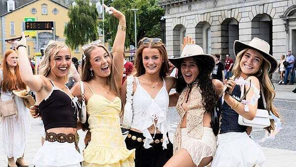 In photos: Crowds enjoy sunshine on year's hottest day ahead of busy weekend of events