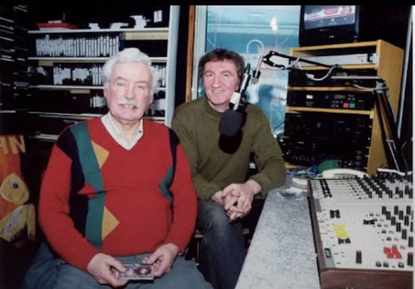 Johnny Mee pictured with poet and singer Seamus Ruttledge during an appearance on the station.