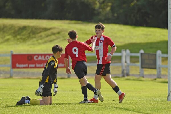 Ballyglass players Ryan Duggan and Benjamin Killeen celebrate after scoring during the U17 Shield final against Achill Rovers at Umbro Park. Ballyglass players Ryan Duggan and Benjamin Killeen celebrate after scoring during the U17 Shield final against Achill Rovers at Umbro Park.