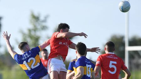 Honours even as 14-man Garry’ are caught at the death