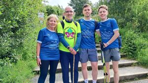 Local Notes: Climbers scale Reek in memory of James