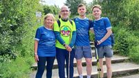 Local Notes: Climbers scale Reek in memory of James