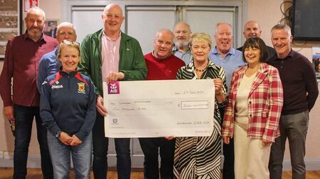 Local Notes: Knockmore GAA Lip Sync committee present cheque to Western Alzheimers.