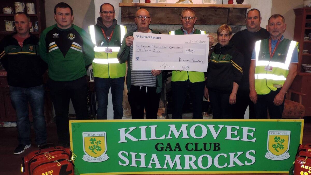 Local Notes: Kilmovee Shamrocks GAA present proceeds of tractor run to Kilmovee Civil Defence