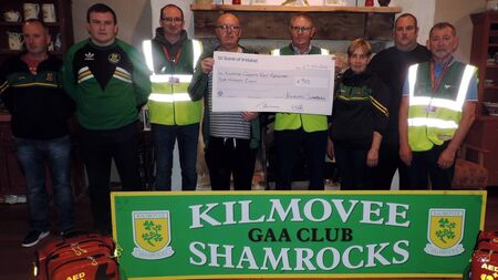 Local Notes: Kilmovee Shamrocks GAA present proceeds of tractor run to Kilmovee Civil Defence