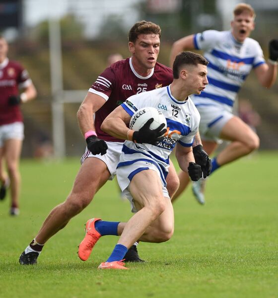Jordan Flynn of Crossmolina tries to tackle Breaffy's Davitt Neary who scored a crucial goal late in normal time. Picture: Conor McKeown