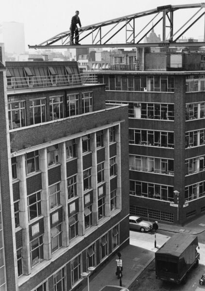  Peter Kerrigan from Donegal standing on the end of the jib of a crane which he was erecting for use in the construction of a car park near Farringdon Road in London on October 8, 1964.	Picture: Fox Photos/Getty Images