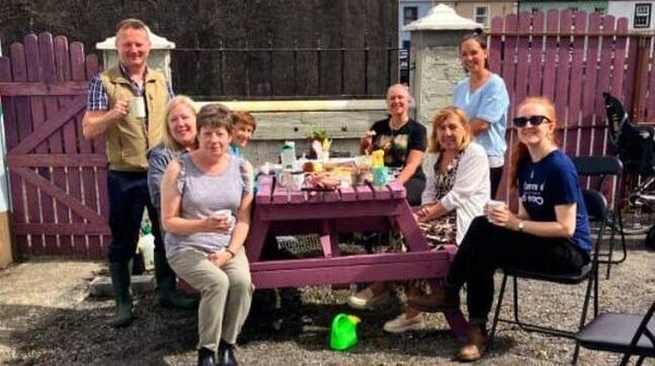 The hardworking volunteers from the Charlestown Organic Community Garden taking a rest for a well deserved cup of tea.