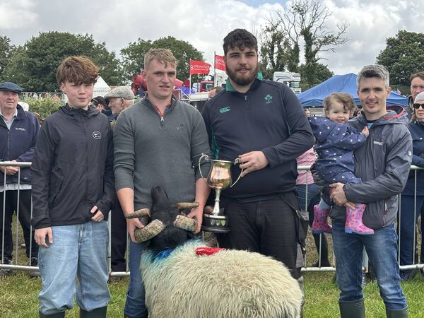 At the presentation during Bonniconlon Show 2025 of the Tony Walsh Memorial Cup for the All-Ireland Mountain Ram competition were, from left, Tony’s great grandson Anthony Walsh, Belgium; Patrick Greavy, Kilgarvin, Bonniconlon (winner); Tony’s grandson James Walsh, Carradoogan; and Tony’s grandson Thomas Walsh and great granddaughter Freya Walsh (Claremorris). 