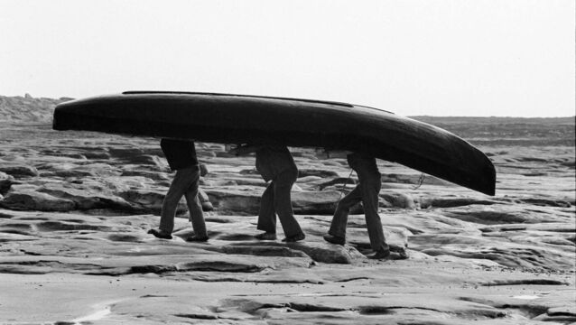 <p>Carrying currach on Inishmaan (1988)</p>