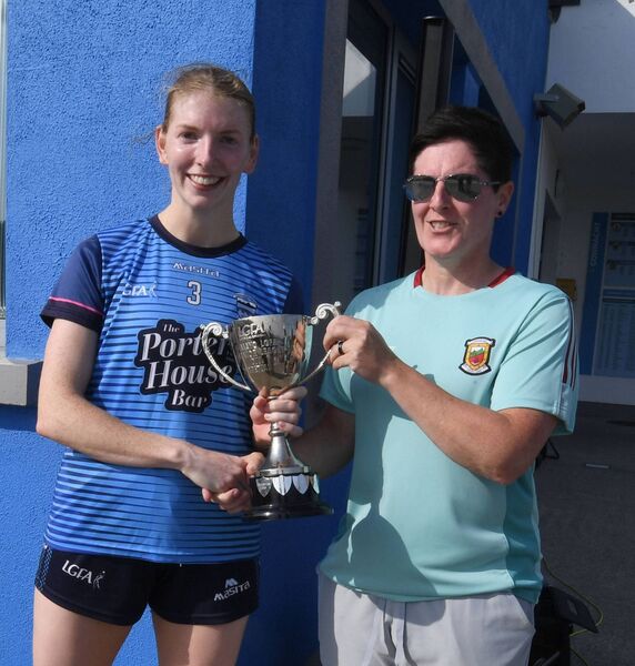 Mayo ladies senior football team manager, Diane O’Hora, presents the Mayo LGFA Division 1 Cup to Westport captain Janette O’Malley. Mayo ladies senior football team manager, Diane O’Hora, presents the Mayo LGFA Division 1 Cup to Westport captain Janette O’Malley.