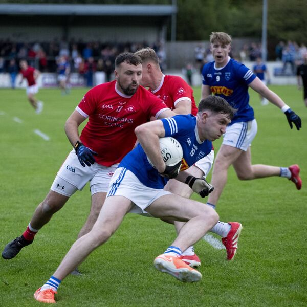 Conor McGuinness of Claremorris in possession with Ballintubber's Gary Loftus close behind. Conor McGuinness of Claremorris in possession with Ballintubber's Gary Loftus close behind.