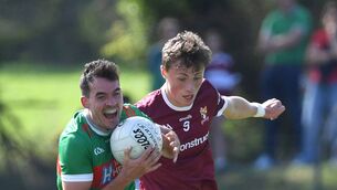 <p>Crossmolina’s Kobe McDonald challenges Ballina Stephenites Mikey Murray for the ball during the Mayo GAA Connacht SFC Rd 2 at St. Tiernan’s GAA Park this afternoon. Picture: David Farrell Photography </p>