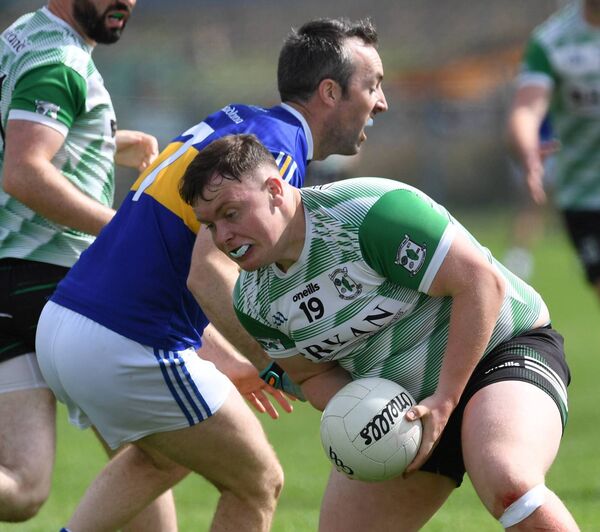 Kiltane’s Seán Gaughan tackles Islandeady’s Seán Collins during the Mayo IFC Round 2 game at Bangor Erris last Sunday. Picture: David Farrell Photography 