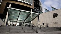 Nail bar worker charged with money laundering after €80k seizure