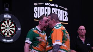 <p>Conor Heneghan and John O'Shea celebrate after winning the MODUS International Pairs week title.</p>