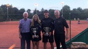 <p>Paul Gavin, president of Castlebar Tennis Club, and head coach Garreth Barry, with Lauren Dunne and Eoghan Jennings who won the U16 girls and U18 boys singles titles at the Junior Lawn Tennis Championships of Ireland.</p>