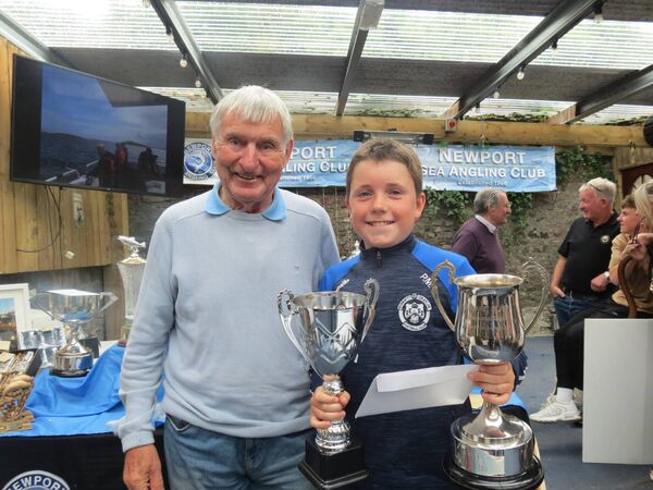 Paul Moran was the overall Junior winner of the 59th Newport SAC Festival competition and received the Margaret Moran Memorial Trophy from Peter Moran. Paul had six fish and 85 points on the day.