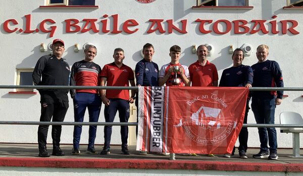 Ballintubber U16 team coaches and team captain, Tiernan O’Toole pictured at a post-match reception at Clogher GAA Complex. Picture by Tom Quinn