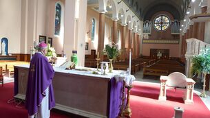 <p>The then Archbishop of Tuam Dr Michael Neary celebrated Sunday Mass in an empty St Mary's Church in Westport during the Covid-19 lockdown. In the absence of a congregation, the Mass was broadcast online and on radio. 	Picture: Frank Dolan</p>