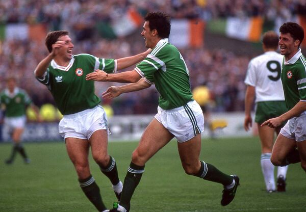 Kevin Sheedy celebrates with Tony Cascarino after coring in the World Cup qualifier against Northern Ireland at Lansdowne Road in 1989. Picture: INPHO/Billy Stickland