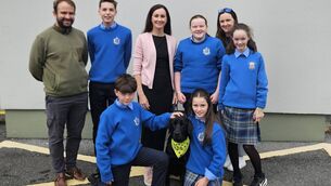 <p>First year students at St Joseph's Secondary Schol, Foxford with Ulani, the school's new community dog, and the handlers who work with Ulani, Deputy Principal Áine McAlpine and teachers Brian Murphy and Sarah Broderick. </p>