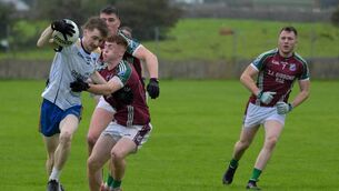 <p>Tony Alyward of Eastern Gaels holds off Stephen Heneghan of Shrule Glencorrib with Evan Cawley and Michael Garvey in close attendance. Picture: John Corless</p>