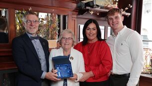 <p>Anne Lyons, second from left, receives her Together for Hospice Hero award at Bewley’s Café in Dublin, with, from left, Cól Campbell of Bewley’s, Martina Jennings of Mayo Roscommon Hospice Foundation and Felix Campbell of Bewley’s. Picture: Robbie Reynolds.</p>