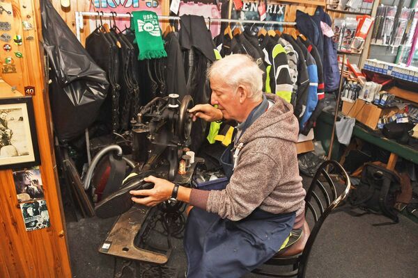 Cobbler Harry McCafferty at work in his shop on Tone Street in Ballina. Picture: John O'Grady