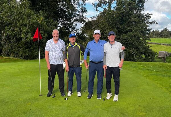 Former Mayo players Tom Byrne and Henry Gavin, left and right, with their Galway opponents Gay McManus and Barry Brennan.
