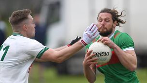 <p>Ballina Stephenites Padraig O’Hora in action against Ballaghaderreen’s Kuba Callaghan during the Connacht Gold Mayo SFC quarter final at Ballaghaderreen this evening. Picture: David Farrell Photography </p>