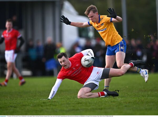 Diarmuid O'Connor of Ballintubber is tackled by Knockmore's Nathan Armstrong. Diarmuid O'Connor of Ballintubber is tackled by Knockmore's Nathan Armstrong.