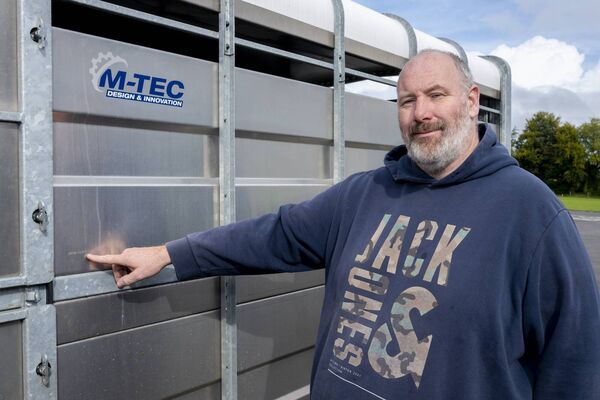 Local farmer, Adrian Fallon points to the indelible security marking on his trailer.