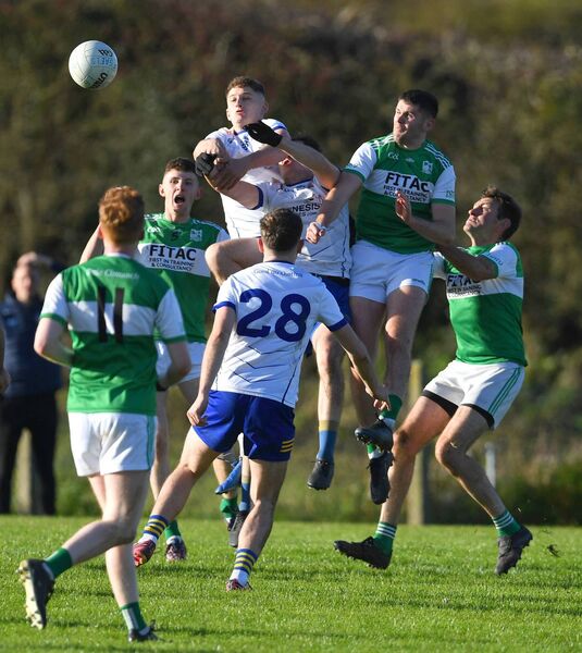 Eastern Gaels and Ballycroy players scramble for midfield possession during the Treanlaur Catering Mayo JFC quarter-final at Brickens last Saturday.	Picture: David Farrell Photography 