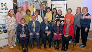 <p>Pictured at the Mayo Older Person's Council (OPC) information day were, from left: Eileen O’Connor, Mayo Age-Friendly Programme Manager; Mairead Cranley, Age-Friendly Ireland Regional Manager; Eileen Piggott, Mayo OPC Executive; Ann Cresham, Vice-Chair, Mayo OPC; John Condon, Acting Chief Executive, Mayo County Council; Mary B. Prendergast, Mayo OPC Executive; Cllr Alma Gallagher, Tess Shannon, Mayo OPC Executive; Mary Whittington, Maureen Moran and Bridget Gibbons, all from Mayo OPC Executive. Front row: Sr Maureen Lally, Mayo Age-Friendly Ambassador; Cllr Sean Carey, Cathaoirleach, Mayo Co Council; Jacqueline Kilcullen, Chairperson, Mayo OPC; Noelene Beckett-Crowe, Vice-Chair, Mayo OPC; Eveleen Horan, Mayo OPC Executive.</p>