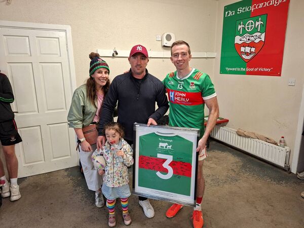 Evan Regan, captain of the Balina senior football team, presented a signed Ballina Stephenites jersey on behalf of all the team to John and Annmarie Dunleavy of Dunleavy Meats who have kindly sponsored a new set of jerseys for the Ballina Stephenites senior team. Evan Regan, captain of the Balina senior football team, presented a signed Ballina Stephenites jersey on behalf of all the team to John and Annmarie Dunleavy of Dunleavy Meats who have kindly sponsored a new set of jerseys for the Ballina Stephenites senior team.