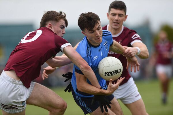 Westport’s Ben Doyle is tackled by Crossmolina’s Dylan Flynn. Picture: Conor McKeown Westport’s Ben Doyle is tackled by Crossmolina’s Dylan Flynn. Picture: Conor McKeown