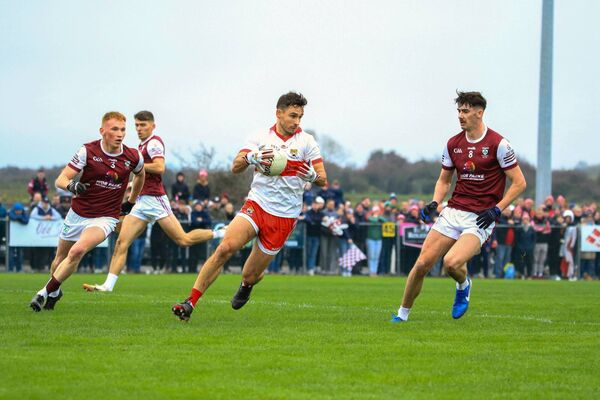 Niall Murphy is watched closely by Evan Lyons and Conor Sheridan of Shamrock Gaels. Picture: Lauren Fitzgerald Niall Murphy is watched closely by Evan Lyons and Conor Sheridan of Shamrock Gaels. Picture: Lauren Fitzgerald